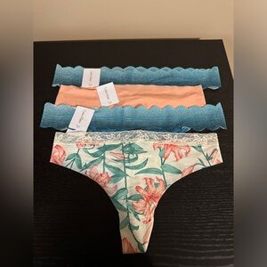 NWT Calvin Klein Set of 4 Thongs Size M